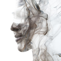 Double exposure portrait of an exotic woman and a smoky texture