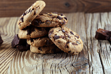 Chocolate cookies on table. Chocolate chip cookies shot with chocolate