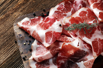 Italian sliced cured coppa with spices. Raw ham. Crudo or jamon