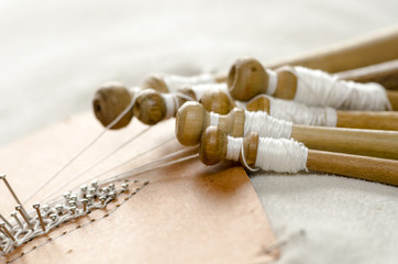 the Tombolo, a particular processing of the interweaving of threads to create fabrics in Italy