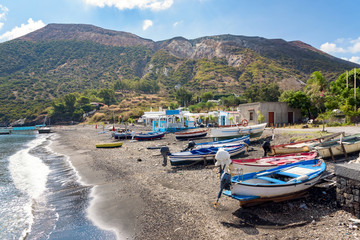 Fototapeta na wymiar Boats on the beach on Vulcano Island