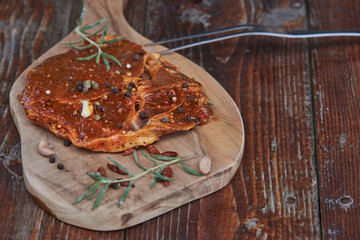 Slices of raw and grilles pork meat