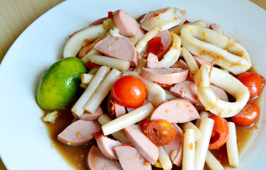 mixed meat Thai salad style with  lotus rootlets and Pickled fish sauce
.(Thai name is Som tam lai bua).