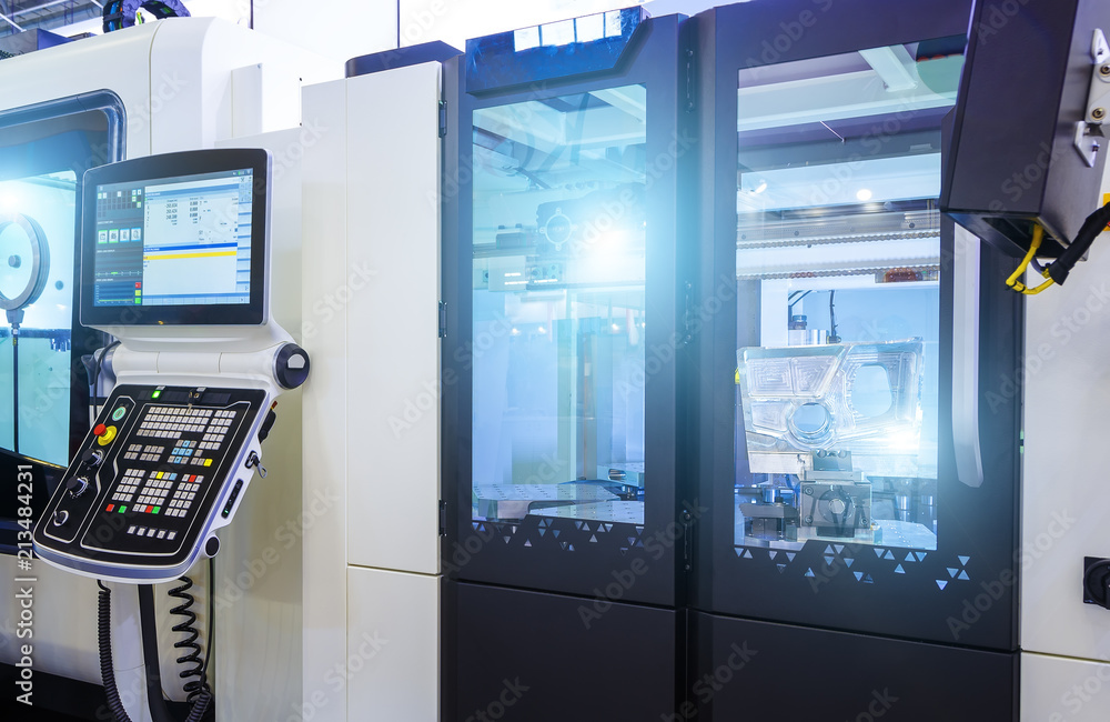 Poster metalworking cnc milling machine. cutting metal modern processing technology. small depth of field. 