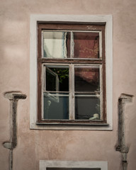 Old House with window in Medieval Tallinn. Estonia.