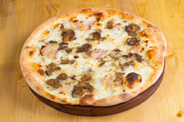 Pizza with mushrooms and ham