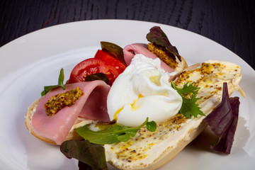 Delicious bruschetta with ham