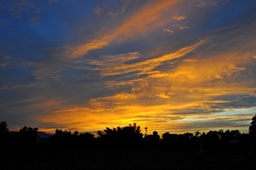 Colorful sky and clouds at sunset with  silhouette of country view in Taiwan
