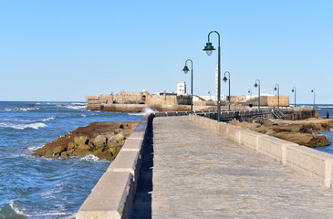 Causeway leading to San Sebastian Castle, Cadiz, Spain © akturer
