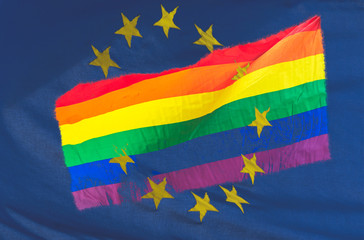 LGBT Rainbow flag blended with European Union Flag, Double Exposure of Rainbow Flag and Blue Flag with Stars, Abstract photography shallow depth of field