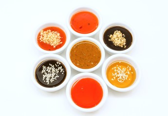 Hoisin sauce,Sweet and sour sauce,Peanut sauce,Honey dip, Cucumber salad in sweet sauce, and spring roll sauce.