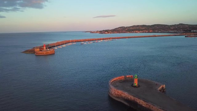 aerial view of red and green lighthouses in Dun Laoghaire, Dublin