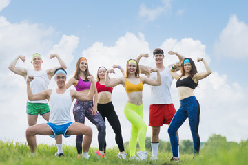 Group of sports people on the grass