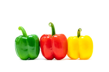 fresh colorful bell peppers isolated on white background