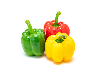 fresh colorful bell peppers isolated on white background