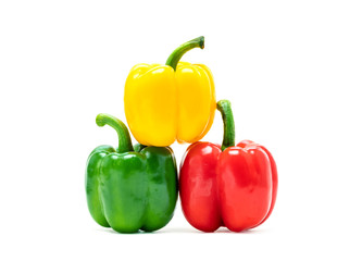 fresh colorful bell peppers isolated on white background