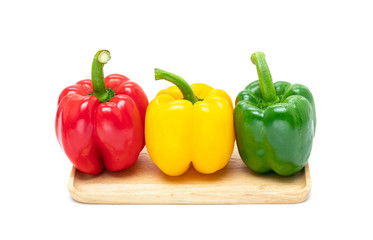 fresh colorful bell peppers isolated on white background