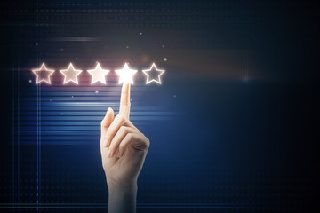 hand touching 5 star symbol