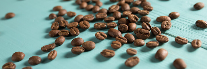 Coffee granules on a blue wooden desk