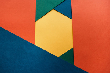 Multicolored paper forming a geometric form with space for text