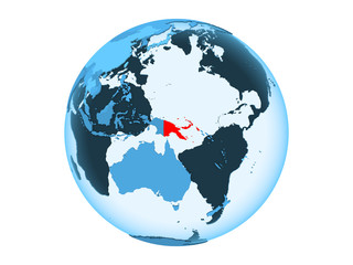 Papua New Guinea on blue globe isolated