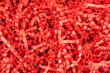 background of red shredded paper