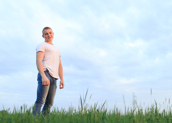 Young man against the sky