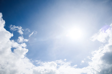 Sun and cloud on blue sky background