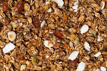 homemade granola with nuts close-up, top view