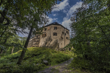 Fototapeta na wymiar Rostejn castle in summer rainy day