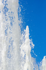 Fountain in city park on hot summer day