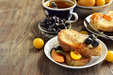 French toast with fresh berries and jam, copy space