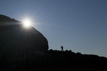 Person following the sun