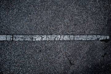 Fototapeta premium Asphalt surface of road with lines abstract background
