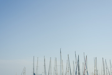 Masts of boats moored in their marina