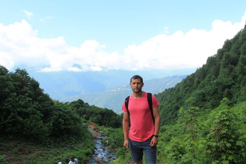 Naklejka premium Summer holiday in mountains, a relax! summer, sea, mountains! Beautiful places, parks, avenues! Mountain falls.