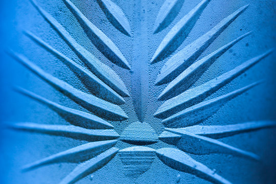 Etched Detail on Blue Glass