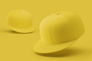 Yellow baseball caps isolated on bright background. Mock up. 3d rendering