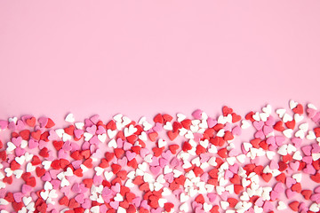 pink background and many sugar red,pink hearts