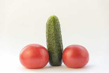 cucumber and tomatoes in the form of a penis