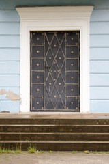 Photo of antique vintage old style forged decorated door