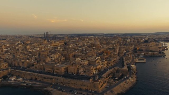Aerial shot flying backwards in Valletta