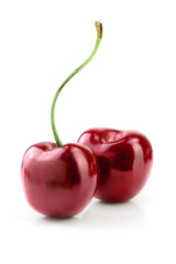Sweet red cherries isolated on white background macro.