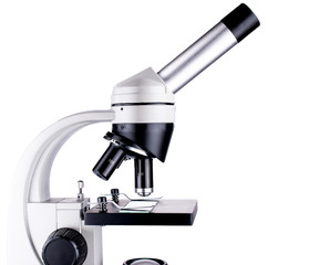 Microscope top part closeup, white background isolated