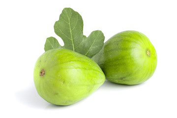 Ripe green fig fruit with leaf isolated on white background