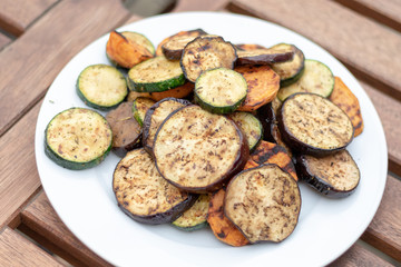 Grilled vegetables on a white plate 