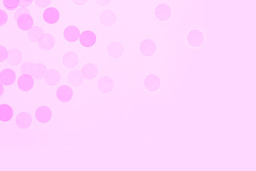 Pink festive confetti background.
