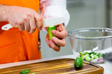 kitchen Preparation: the chef prepares a salad