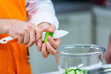 kitchen Preparation: the chef prepares a salad
