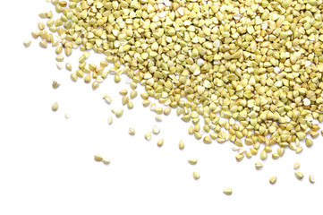 Green buckwheat groat isolated on white